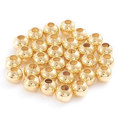 Koraliki przekładki złote