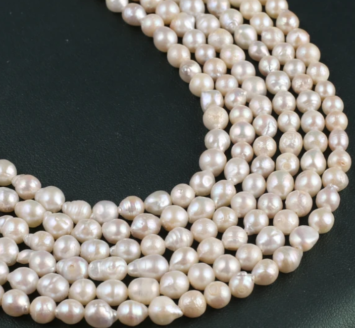Perła słodkowodna kremowa gruszka B 5-6mm sznur/+-55szt